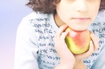 Nutrition: Little Girl Holding Apple